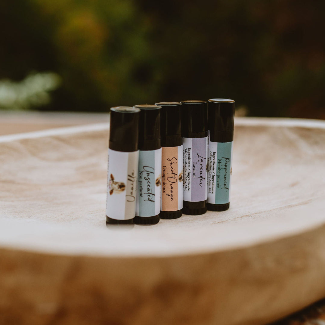 BFF Naturals Lip Balm tubes on wooden bowl
