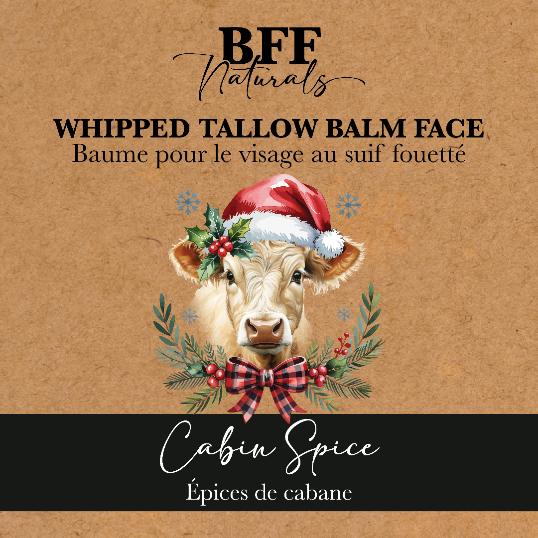 Product label for 'BFF Naturals Whipped Tallow Balm Face' with a cow wearing a Santa hat and wreath on a brown background.